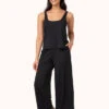 The All-Day Wide Leg Pant: Jet Black -LuxeIntimates Store 1 on model front all day wide leg pant jet black