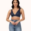 The Crochet Lace Plunge Bralette: Navy -LuxeIntimates Store 1 on model front crochet lace plunge bralette navy