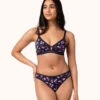 The Mesh Trim Bralette - Print: Navy Daisy -LuxeIntimates Store 1 on model front mesh trim bralette navy daisy
