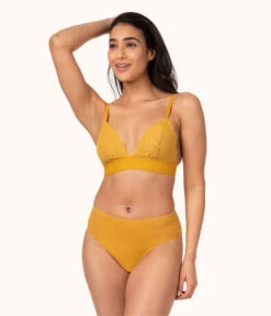 The Long-Lined Lace Bralette Trio: Turmeric/Toasted Almond/Jet Black -LuxeIntimates Store 2 on model front long lined lace bralette trio multi b0c4f981 b53d 4404 bbcb 3270d503bf0c