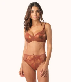 Front Page -LuxeIntimates Store 2 on model front metallic palm mesh undie bundle burnished mahogony foil