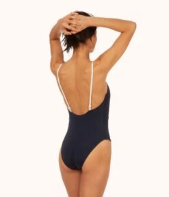The V One Piece: Navy/White -LuxeIntimates Store 3 on model back v one piece navy a589f683 8576 4028 b6f9 effcb05683b3